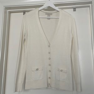 Cream button down sweater with white and gold button details